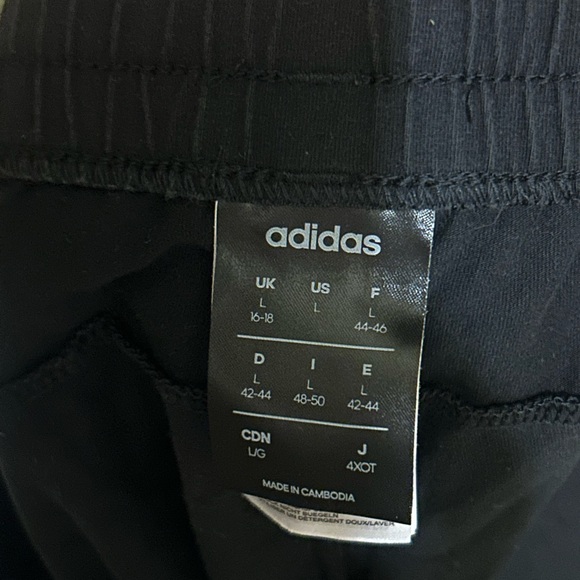 Adidas Women's Black Athletic Shorts with White Stripes - Picture 3 of 3